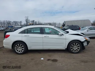 2013 Chrysler 200 Touring with VIN 1C3CCBBG6DN703660, listed as a IAAI auction lot 41646880 with 166,345 mi miles. Bid and sale history available at carsss.com. Image 14.