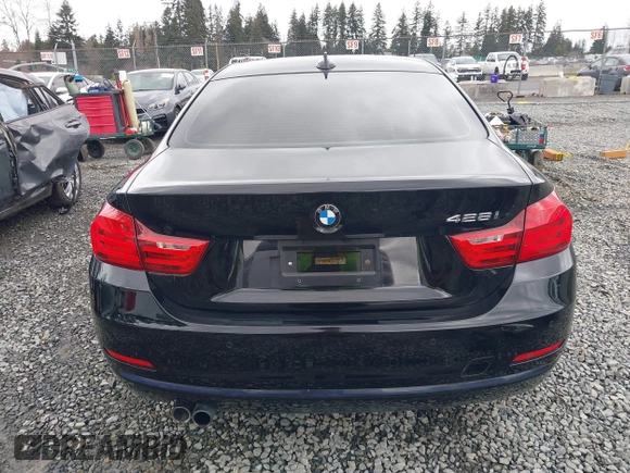 2014 BMW 4 Series 428i with VIN WBA3N3C50EK230489, listed as a IAAI auction lot 41613944 with 86,553 mi miles and . Bid and sale history available at DreamBid. Image 17.