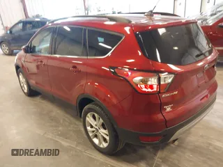 2018 Ford Escape SEL z VIN 1FMCU9HD7JUB52313, wystawiony jako IAAI lot #41901949 z przebiegiem 100 568 mil mil oraz . Historia ofert i sprzedaży dostępna na DreamBid. Obrazek 3.