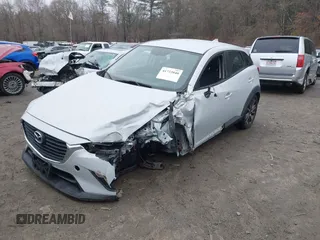 2017 Mazda CX-3 Touring with VIN JM1DKFC77H0155101, listed as a IAAI auction lot 41722040 with 92,653 mi miles. Bid and sale history available at carsss.com. Image 2.