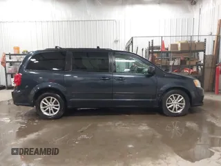 2014 Dodge Grand Caravan SXT with VIN 2C4RDGCGXER154709, listed as a IAAI auction lot 41117603 with 214,872 mi miles and . Bid and sale history available at DreamBid. Image 13.