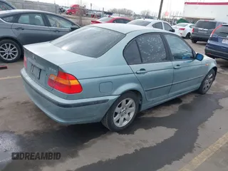 2003 BMW 3 Series 325i with VIN WBAAZ334X3PH34084, listed as a IAAI auction lot 41492157 with 149,254 mi miles. Bid and sale history available at carsss.com. Image 4.