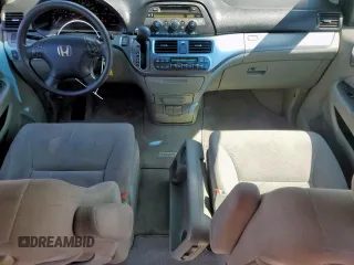 2007 Honda Odyssey EX with VIN 5FNRL38437B068697, listed as a Copart auction lot 60875505 with 211,688 mi miles and Salvage title. Bid and sale history available at DreamBid. Image 8.