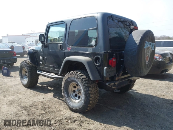 2004 Jeep Wrangler Rubicon with VIN 1J4FA69S64P789308, listed as a IAAI auction lot 41714489 with 186,302 mi miles. Bid and sale history available at carsss.com. Image 3.