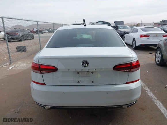 2022 Volkswagen Passat 2.0T Limited Edition with VIN 1VWBA7A32NC006523, listed as a IAAI auction lot 41263642 with 52,578 mi miles. Bid and sale history available at carsss.com. Image 16.