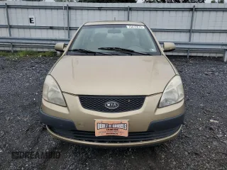 2009 Kia Rio LX with VIN KNADE223096485561, listed as a Copart auction lot 73412874 with 137,858 mi miles and Salvage Title. Bid and sale history available at DreamBid. Image 5.