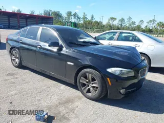 2012 BMW 5 Series 528i with VIN WBAXG5C58CDX06402, listed as a IAAI auction lot 41411891 with 145,998 mi miles. Bid and sale history available at carsss.com. Image 1.