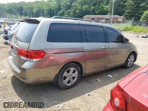 2008 Honda Odyssey Touring z VIN 5FNRL38968B025520, wystawiony jako Copart lot #60799645 z przebiegiem 116 592 mil mil oraz Szkoda całkowita • Salvage title. Historia ofert i sprzedaży dostępna na DreamBid. Obrazek 3.