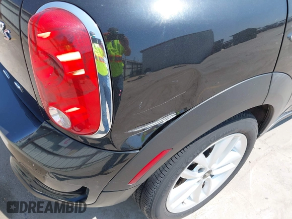 2014 MINI Countryman S z VIN WMWZC3C58EWT01074, wystawiony jako IAAI lot #42238095 z przebiegiem 83 252 mil mil oraz . Historia ofert i sprzedaży dostępna na DreamBid. Obrazek 17.