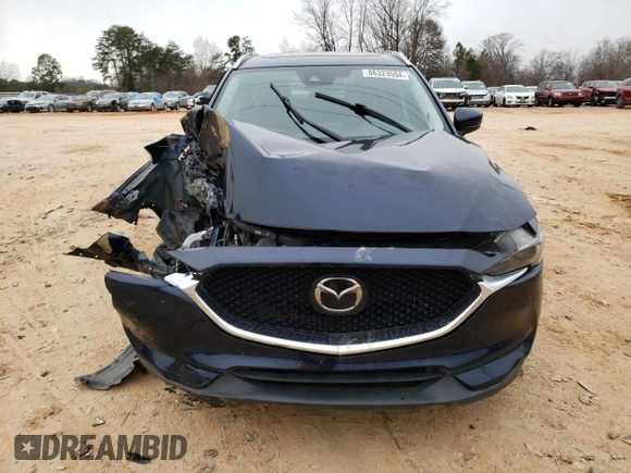 2019 Mazda CX-5 Grand Touring with VIN JM3KFADM0K1596256, listed as a Copart auction lot 86323594 with 118,853 mi miles and Salvage title. Bid and sale history available at DreamBid. Image 5.