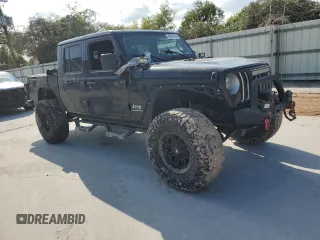 2021 Jeep Gladiator High Altitude with VIN 1C6HJTFG4ML546222, listed as a Copart auction lot 80474614 with Not provided miles and Salvage title. Bid and sale history available at DreamBid. Image 4.