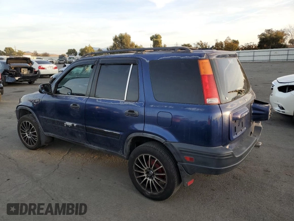 1999 Honda CR-V LX with VIN JHLRD1742XC066975, listed as a Copart auction lot 79447754 with 214,729 mi miles and Salvage Title. Bid and sale history available at carsss.com. Image 2.