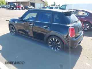 2015 MINI Hardtop 4 Door S z VIN WMWXU3C58F2B57218, wystawiony jako IAAI lot #42361437 z przebiegiem 96 984 mil mil oraz . Historia ofert i sprzedaży dostępna na DreamBid. Obrazek 3.