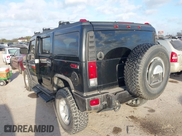 2006 Hummer H2 with VIN 5GRGN23U96H116719, listed as a IAAI auction lot 41781406 with 175,118 mi miles. Bid and sale history available at carsss.com. Image 3.