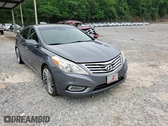 2012 Hyundai Azera z VIN KMHFH4JG2CA170845, wystawiony jako Copart lot #54875955 z przebiegiem 98 047 mil mil oraz Szkoda całkowita • Salvage title. Historia ofert i sprzedaży dostępna na DreamBid. Obrazek 13.