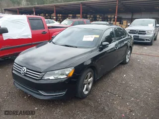 2014 Volkswagen Passat SE w/Sunroof with VIN 1VWBT7A36EC093451, listed as a IAAI auction lot 41682706 with 165,693 mi miles. Bid and sale history available at carsss.com. Image 2.