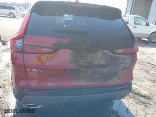2025 Honda CR-V Hybrid Sport-L with VIN 7FARS6H81SE018403, listed as a IAAI auction lot 40871756 with 4,124 mi miles. Bid and sale history available at carsss.com. Image 6.