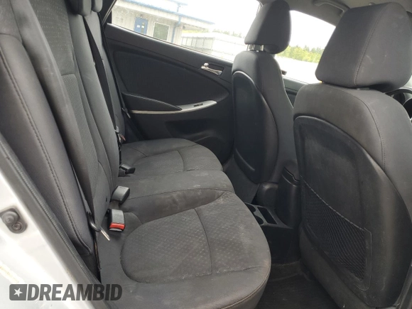 2013 Hyundai Accent SE z VIN KMHCU5AE2DU118005, wystawiony jako Copart lot #57415595 z przebiegiem 123 865 mil mil oraz Czysty tytuł • Clean title. Historia ofert i sprzedaży dostępna na DreamBid. Obrazek 10.