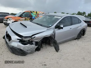 2024 Subaru WRX Premium z VIN JF1VBAH64R9808221, wystawiony jako Copart lot #54990545 z przebiegiem 105 565 mil mil oraz Szkoda całkowita • Salvage title. Historia ofert i sprzedaży dostępna na DreamBid. Obrazek 1.
