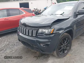 2018 Jeep Grand Cherokee Upland with VIN 1C4RJFAG4JC249243, listed as a IAAI auction lot 42291794 with 194,501 mi miles and . Bid and sale history available at DreamBid. Image 6.
