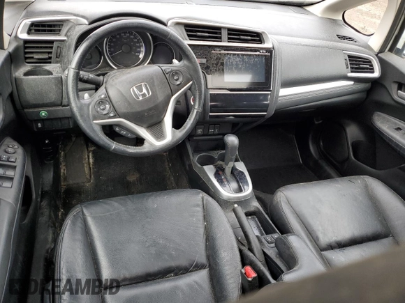 2015 Honda Fit EX-L z VIN 3HGGK5H84FM107978, wystawiony jako Copart lot #54879335 z przebiegiem 193 583 mil mil oraz Nie do naprawy • Non repairable. Historia ofert i sprzedaży dostępna na DreamBid. Obrazek 8.