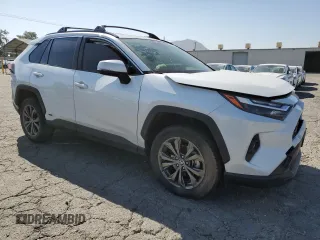 2024 Toyota RAV4 Hybrid XLE Premium with VIN JTMB6RFV6RD120633, listed as a Copart auction lot 57620825 with 28,817 mi miles and Salvage title. Bid and sale history available at DreamBid. Image 4.