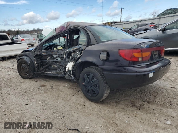 2000 Saturn SL with VIN 1G8ZK5274YZ145472, listed as a Copart auction lot 42871945 with Not provided miles and Salvage title. Bid and sale history available at DreamBid. Image 2.