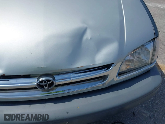 2000 Toyota Sienna LE with VIN 4T3ZF13C4YU211145, listed as a IAAI auction lot 42705612 with 217,825 mi miles and . Bid and sale history available at DreamBid. Image 6.