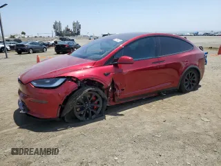 2024 Tesla Model X Plaid with VIN 7SAXCBE63RF442058, listed as a Copart auction lot 57294374 with 2,274 mi miles and Salvage Title. Bid and sale history available at DreamBid. Image 1.