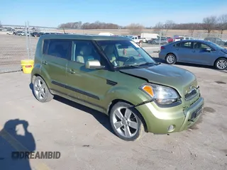 2011 Kia Soul + with VIN KNDJT2A2XB7281113, listed as a IAAI auction lot 41869852 with 155,095 mi miles. Bid and sale history available at carsss.com. Image 1.