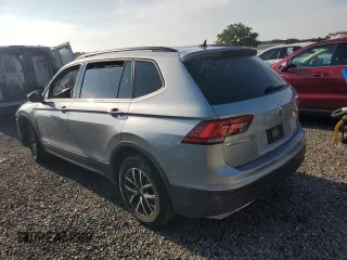 2021 Volkswagen Tiguan S with VIN 3VV1B7AX9MM023655, listed as a Copart auction lot 64159445 with 55,795 mi miles and Salvage title. Bid and sale history available at DreamBid. Image 2.