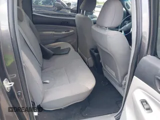 2013 Toyota Tacoma PreRunner with VIN 5TFKU4HN8DX004458, listed as a IAAI auction lot 42371898 with 142,532 mi miles and . Bid and sale history available at DreamBid. Image 8.