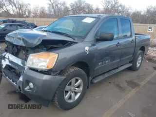 2014 Nissan Titan Pro-4X with VIN 1N6BA0EC3EN514358, listed as a IAAI auction lot 41636363 with 166,201 mi miles and . Bid and sale history available at DreamBid. Image 17.