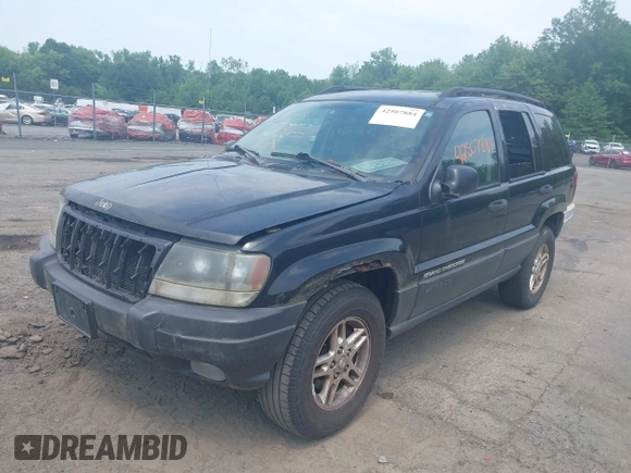 2003 Jeep Grand Cherokee Laredo with VIN 1J4GW48S03C557756, listed as a IAAI auction lot 42507884 with 195,236 mi miles and . Bid and sale history available at DreamBid. Image 2.
