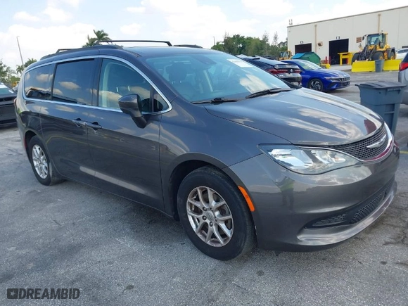 2021 Chrysler Voyager LXI with VIN 2C4RC1DG3MR565141, listed as a IAAI auction lot 42065933 with 134,138 mi miles. Bid and sale history available at carsss.com. Image 1.