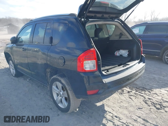 2013 Jeep Compass Sport with VIN 1C4NJCBB2DD250650, listed as a IAAI auction lot 41068228 with 148,549 mi miles. Bid and sale history available at carsss.com. Image 3.