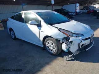 2022 Toyota Prius L Eco with VIN JTDKAMFU2N3161771, listed as a IAAI auction lot 41428804 with 113,777 mi miles. Bid and sale history available at carsss.com. Image 1.