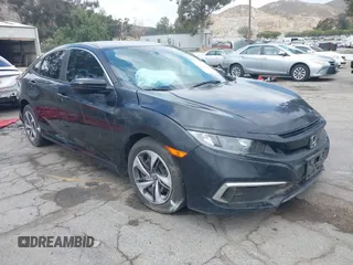2020 Honda Civic Sedan LX with VIN 19XFC2F65LE205947, listed as a IAAI auction lot 33199503 with 1 mi miles. Bid and sale history available at carsss.com. Image 1.