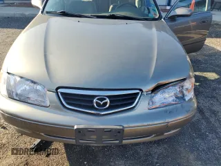 2001 Mazda 626 LX with VIN 1YVGF22C515232947, listed as a Copart auction lot 80978324 with 73,674 mi miles and Non Repairable. Bid and sale history available at carsss.com. Image 11.