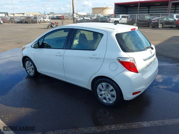 2014 Toyota Yaris L with VIN JTDKTUD31ED586784, listed as a IAAI auction lot 41344076 with 79,569 mi miles. Bid and sale history available at carsss.com. Image 3.