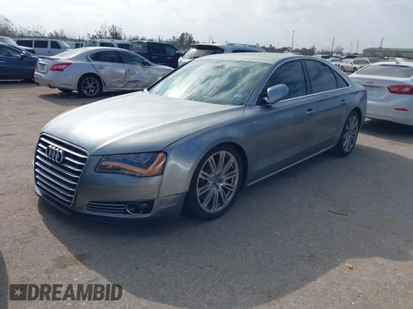 2011 Audi A8 with VIN WAUAVAFD5BN021080, listed as a IAAI auction lot 41223418 with 80,538 mi miles and . Bid and sale history available at DreamBid. Image 2.
