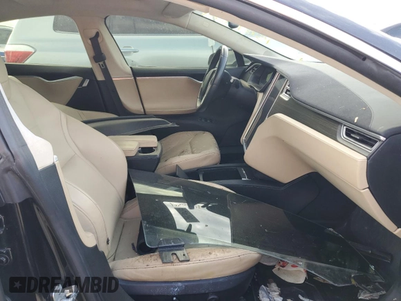 2016 Tesla Model S 90D с VIN 5YJSA1E27GF125739, выставлен на аукционе Copart как лот 75074624 с пробегом Не указан миль и Списание • Salvage title. История ставок и продаж доступна на DreamBid. Изображение 7.