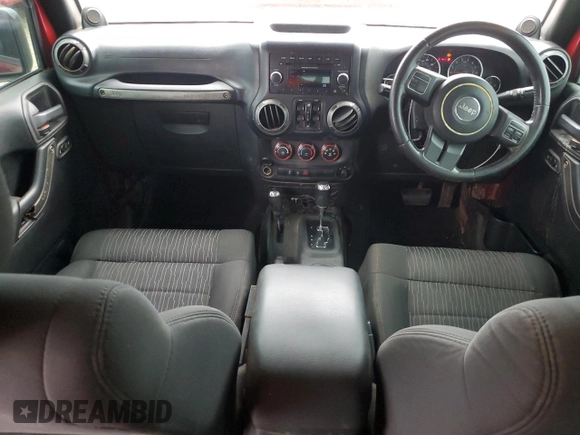 2012 Jeep Wrangler Unlimited Sport RHD with VIN 1C4BJWKGXCL102279, listed as a Copart auction lot 75360814 with 262,514 mi miles and Salvage title. Bid and sale history available at DreamBid. Image 8.
