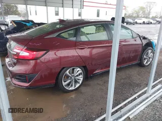 2018 Honda Clarity Plug-In Hybrid Touring with VIN JHMZC5F3XJC005797, listed as a IAAI auction lot 42021622 with 58,307 mi miles. Bid and sale history available at carsss.com. Image 4.