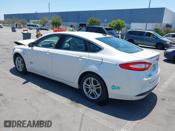 2016 Ford Fusion Titanium z VIN 3FA6P0SU1GR116118, wystawiony jako IAAI lot #42685489 z przebiegiem 138 690 mil mil oraz . Historia ofert i sprzedaży dostępna na DreamBid. Obrazek 3.