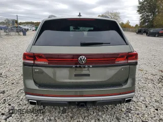 2024 Volkswagen Atlas Peak Edition SE with VIN 1V2CR2CA4RC575859, listed as a Copart auction lot 76310634 with 1,228 mi miles and Salvage title. Bid and sale history available at DreamBid. Image 6.