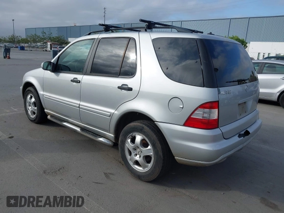 2003 Mercedes-Benz M 350 with VIN 4JGAB57EX3A435535, listed as a IAAI auction lot 42099551 with 205,226 mi miles and . Bid and sale history available at DreamBid. Image 3.
