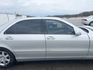 2000 Mercedes-Benz S-Class with VIN WDBNG70JXYA054073, listed as a IAAI auction lot 41987179 with 124,968 mi miles. Bid and sale history available at carsss.com. Image 13.
