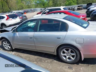 2005 Nissan Altima S z VIN 1N4AL11D45C160770, wystawiony jako IAAI lot #41977821 z przebiegiem 220 067 mil mil oraz . Historia ofert i sprzedaży dostępna na DreamBid. Obrazek 14.