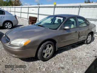 2002 Ford Taurus SEL Deluxe with VIN 1FAHP56S92G122795, listed as a Copart auction lot 73642794 with 82,785 mi miles and Salvage Title. Bid and sale history available at carsss.com. Image 1.